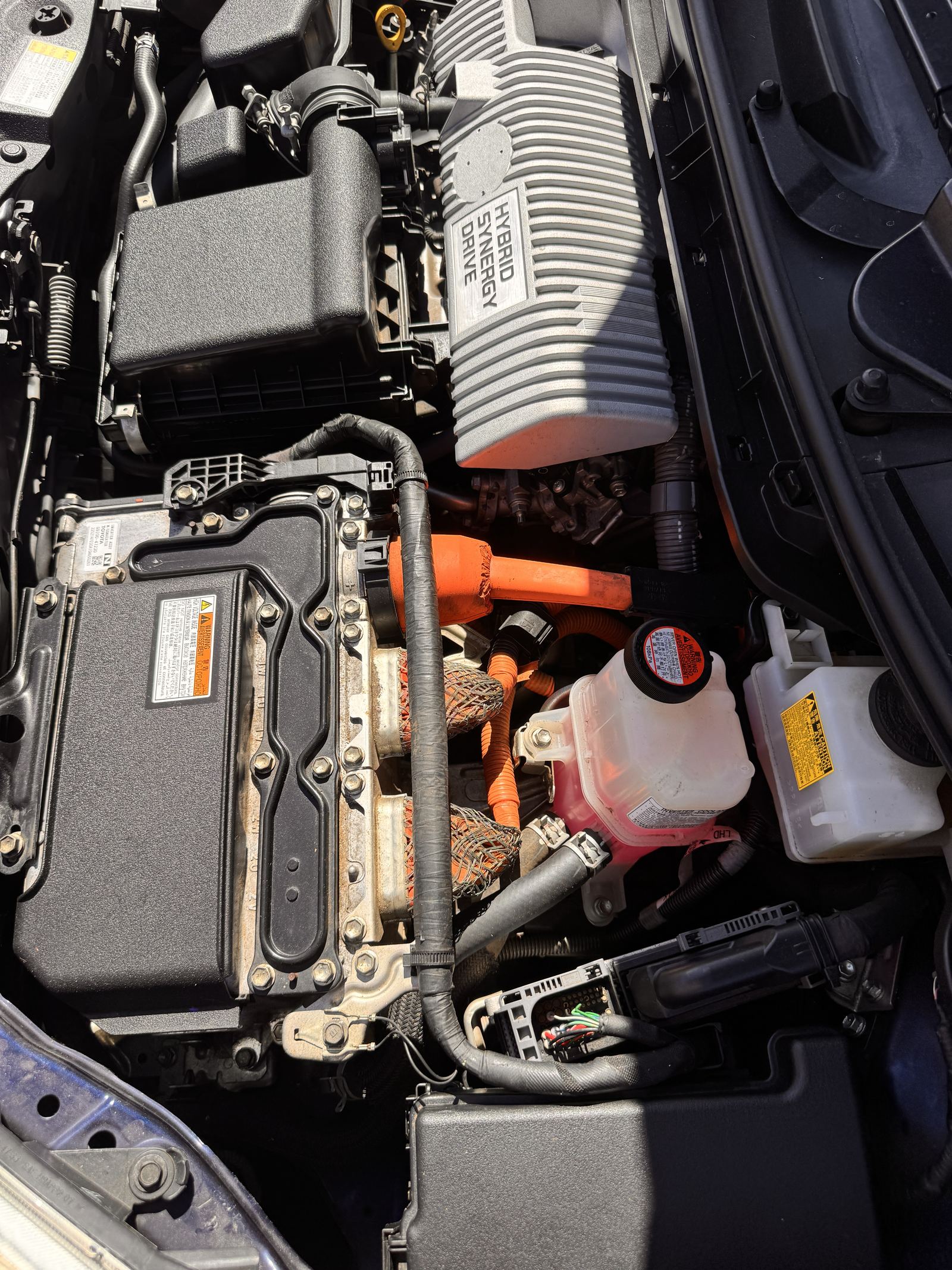 Hybrid Synergy Drive engine bay during a pre-purchase inspection