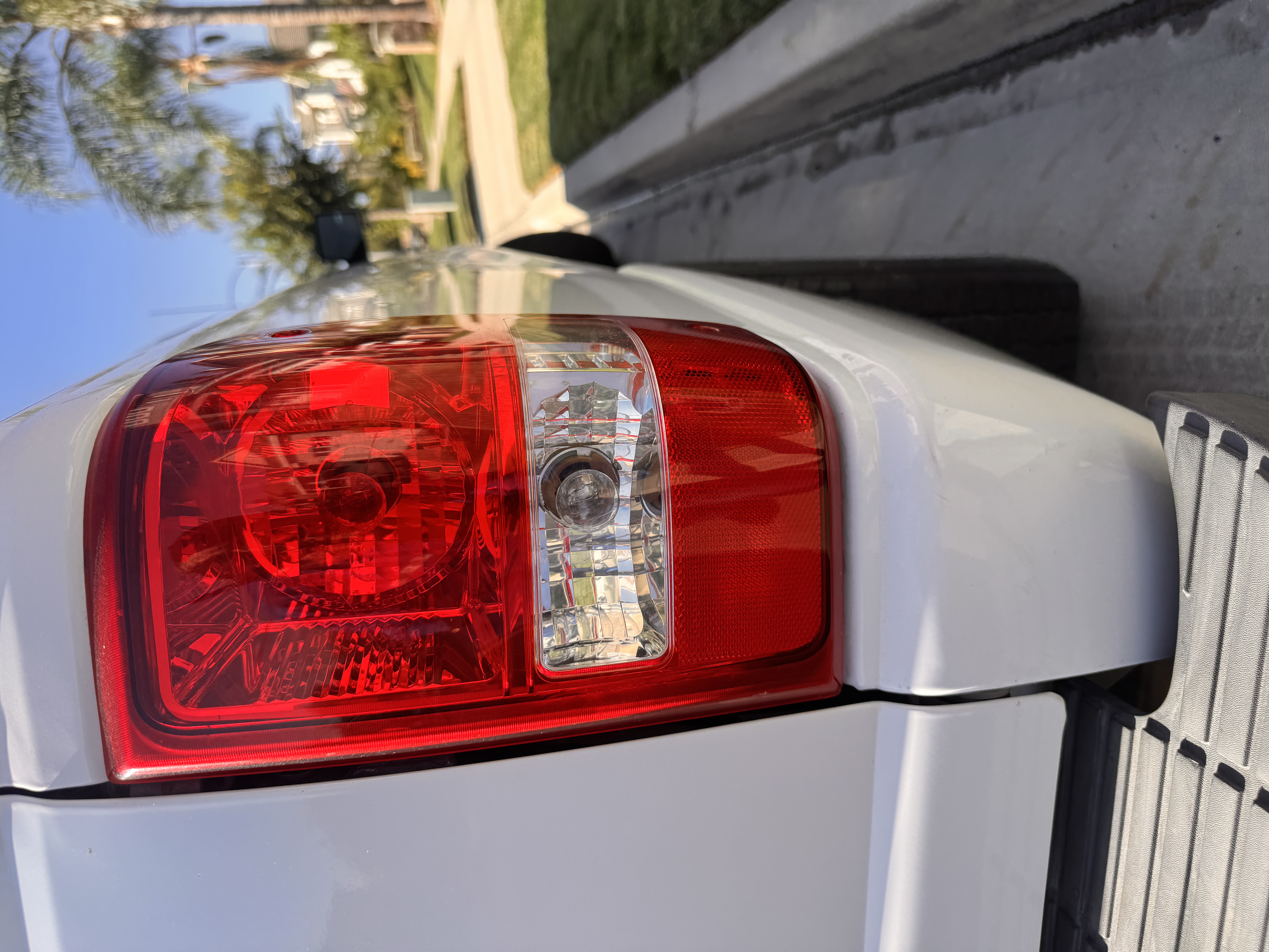 Close inspection of a vehicle taillight and reflector assembly